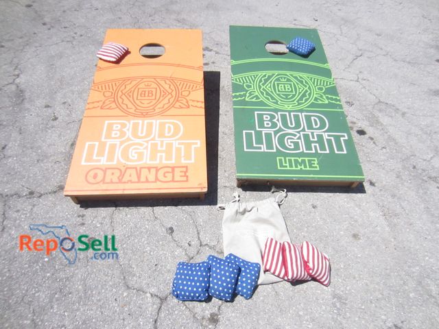 Lot 31-9324 - Bud Light wood cornhole game and beanbags.