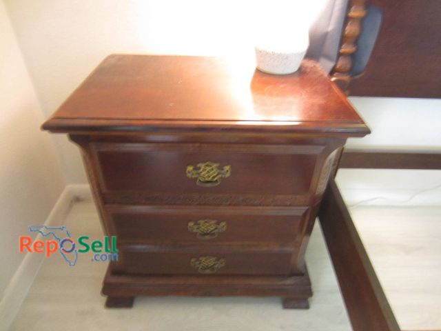 Lot 31-8642 - (1) Three-Drawer Wood Nightstand With Pull Handles - 24" x 25 x 16