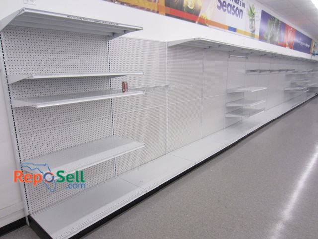 Lot 31-3007 - (15) 4' Retail Shelving w/Peg Board Backers, 25" Deep Shelves, Buyer Must Disassemble &amp; Remove.