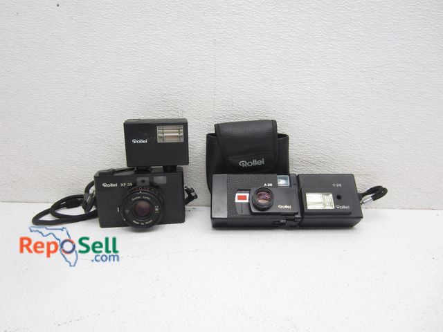 Lot 31-8613 - (2) Rollei Cameras: (1) XF 35 w/E15 Flash, (1) A 26 w/C 26 Flash &amp; Case