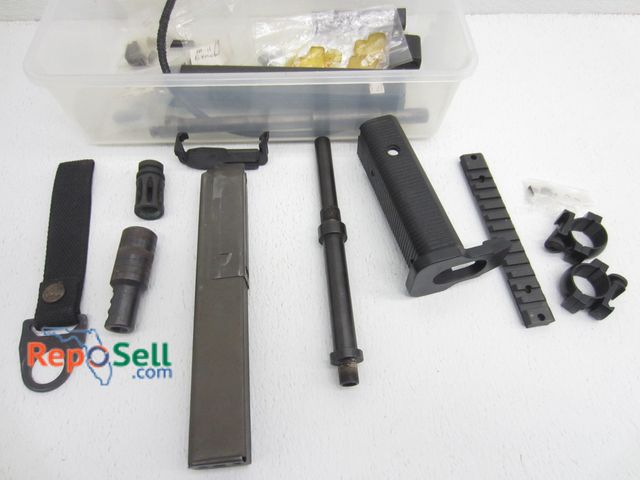 Lot 31-6090 - Firearm Parts And Acces: Locks, Mags, Barrel Tips etc