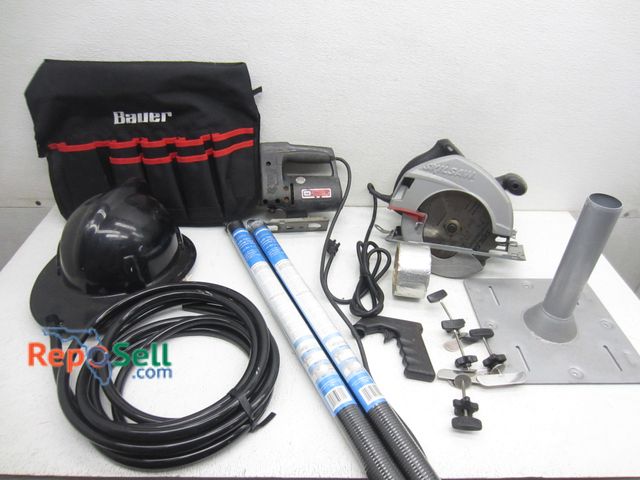 Lot 31-9380 - Tool lot; Bauer bucket tool bag, Skilsaw circular saw, garage door springs, etc. (bring tote)