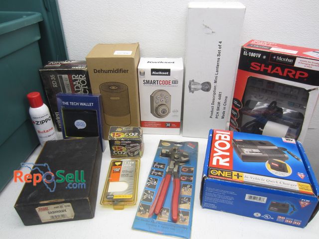 Lot 31-9204 - Estate Lot: Electric Deadbolt, Printing Calculator, Some NOS, etc. with Tote