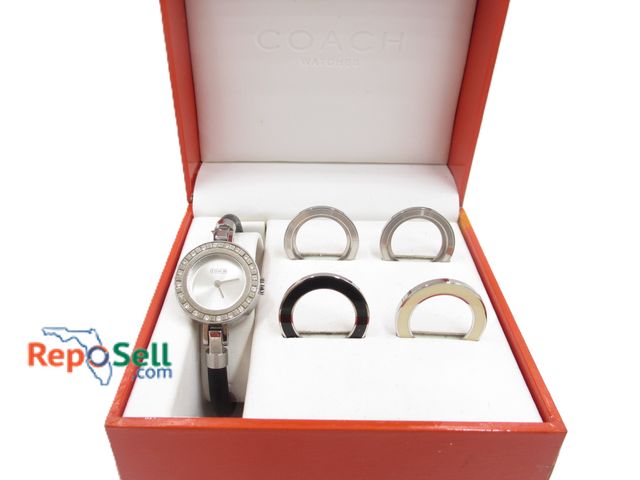 Lot 31-2011 - Coach Swiss Made Diamond Watch with Box and (4) Bezels - 0111S, 7.035.688 - No COA