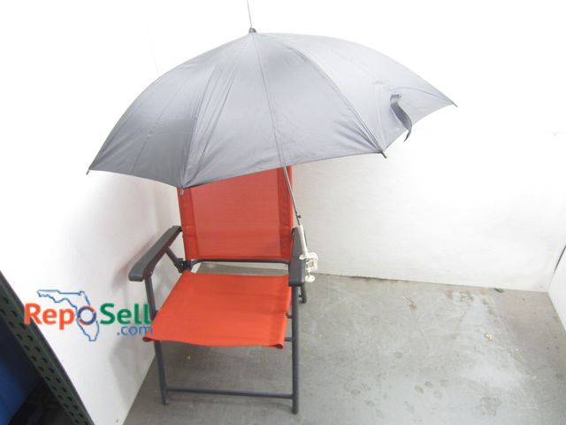 Lot 31-1174 - Foldable Outdoor Chair w/Attachable Umbrella