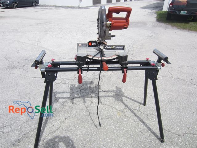 Lot 31-5512 - B&amp;D Firestorm Miter Saw (powers on) and Craftsman Foldable Miter Saw Stand w/Extension