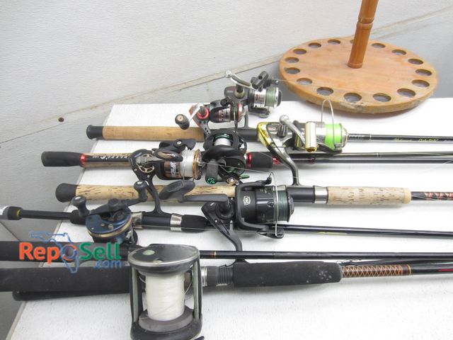 Lot 31-6274 - (8) Rods and Reels with wood holder: Penn, Shakespeare, Abu Garcia, etc.