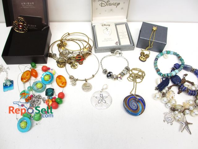 Lot 31-1024 - Costume Jewelry Lot: Disney, Kors and Unique with Boxes, Disney Bangles, Sealife Necklace, Pendant, ...
