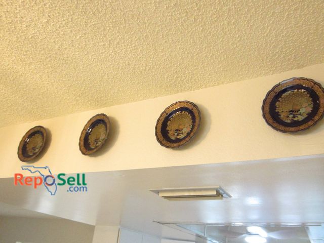 Lot 31-8667 - (4) Decorative 6" Blue Porcelain Plates With Gilded Peacock Motif