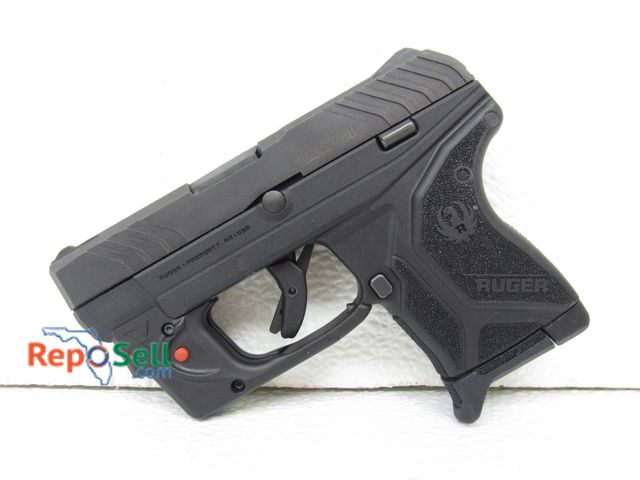 Lot 31-9160 - Ruger LCP II with Viridian Red laser, includes one magazine, pocket holster and box.