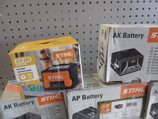 Lot 31-1165 - Five New Stihl Branded Batteries Featuring Models AP100, AK20, And Other AK Variants. Batteries Are ...