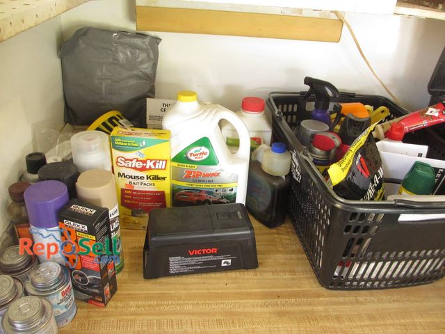 Lot 31-8599 - Household Chemicals And Pest Control Supplies & Tubes of Caulk