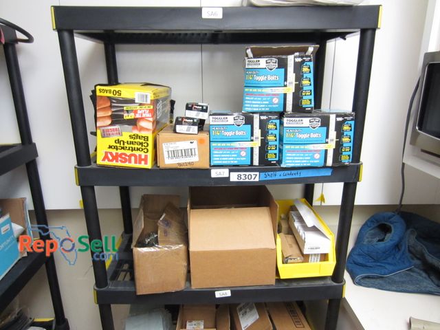 Lot 31-8307 - Shelf and Contents: Toggle Bolts, Paslode Nails, Screws, Trash Bags Shelf Measures 74" x 35" x 18"
