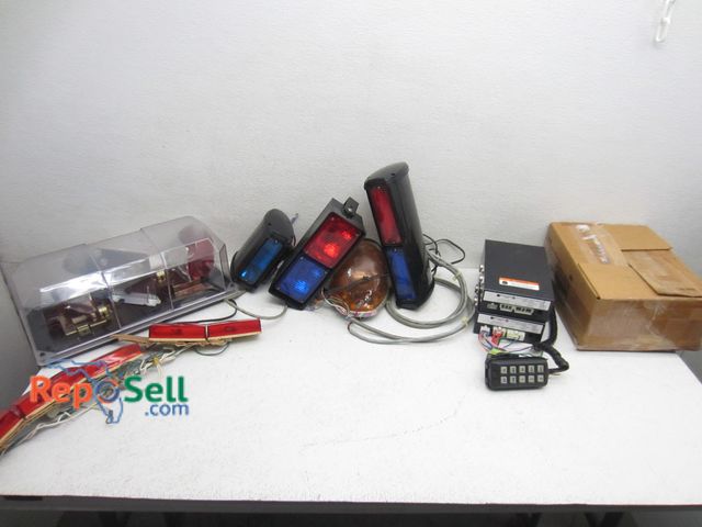 Lot 31-9411 - (6) Police car lights amber, red &amp; blue &amp; (2) siren amplifiers with accessories