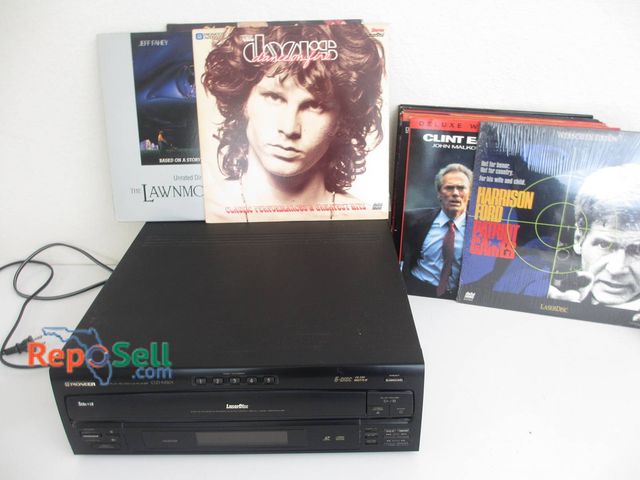 Lot 31-8539 - Pioneer CLD-M401 LaserDisc/CD Player (no remote) With LaserDisc Movie Lot (16)