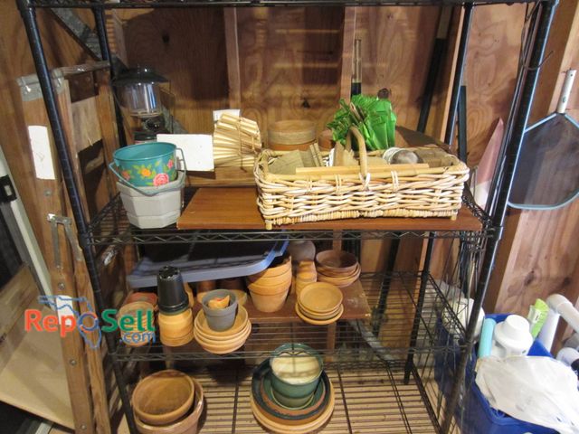 Lot 31-9215 - Black Storage Shelf with contents: Garden pots in terracotta, ceramic, and plastic materials of vary...