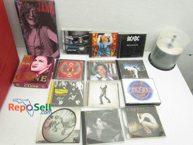 Lot 31-9498 - Approx (130) CD's: Patsy Kline, Bob Marley, AC DC etc