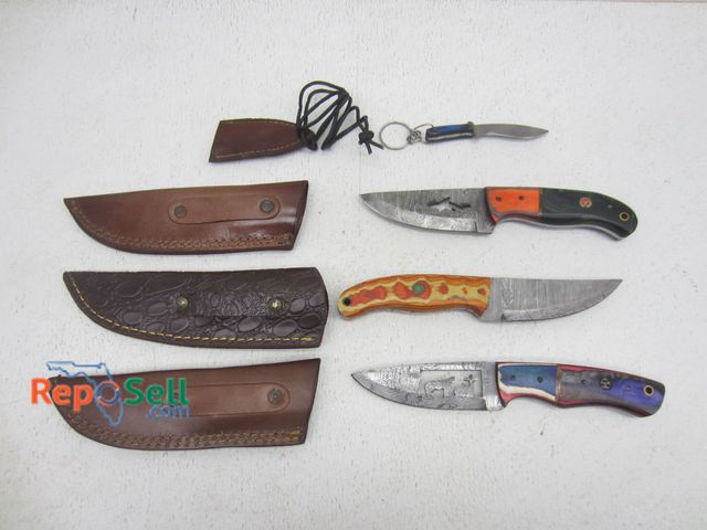 Lot 31-6228 - (4) Damascus Style Knives, (4) Sheaths