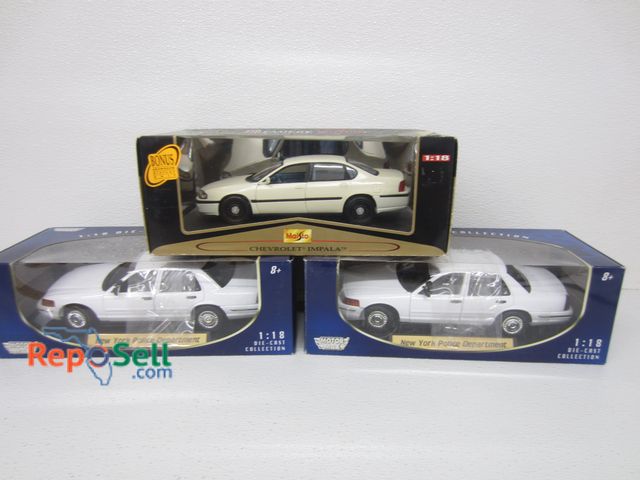 Lot 31-1211 - (3) Diecast Cars New Inbox 1:18 Scale: Bonus Display Chevy Impala, (2) New York Police, etc.