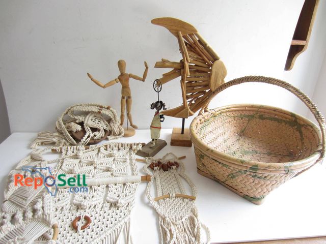 Lot 31-9197 - Items featuring a woven basket with a loop handle, macrame wall hangings with wooden accents, a smal...