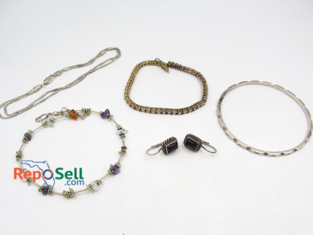 Lot 31-2022 - Jewelry Lot: Gemstone Bracelet, Quartz Bracelet, .925 Earrings &amp; Bangle (24.17g total)