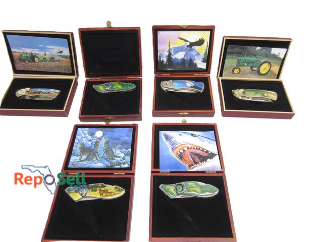Lot 31-5408 - (6) Boxed Knives: Variety of Designs: Shark, Wolves, John Deere, etc.