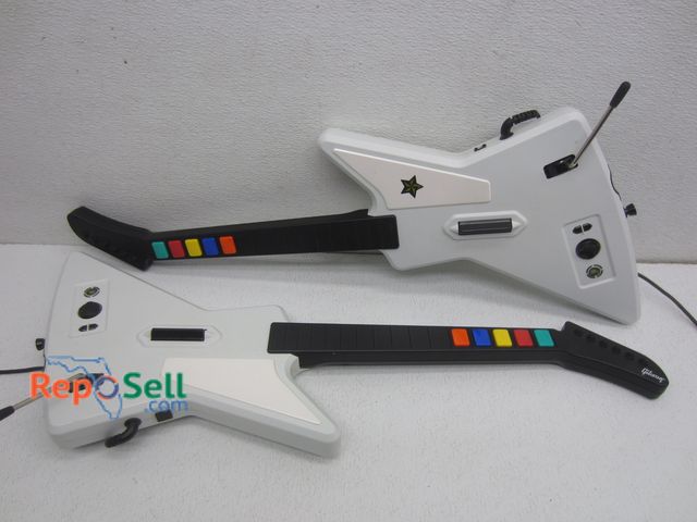 Lot 31-6371 - (2) Xbox Guitars #95055