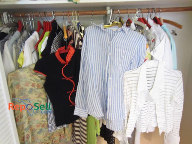 Lot 31-9038 - Women's Clothing Collection With Various Colors, Patterns, Materials, And Sizes.