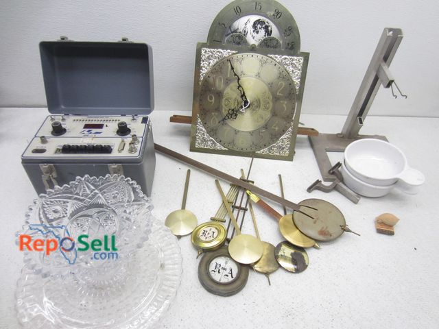 Lot 31-6247 - Estate lot: transponder ramp tester, clock parts, glass, 77-gallon Kobalt tote With lid included, et...