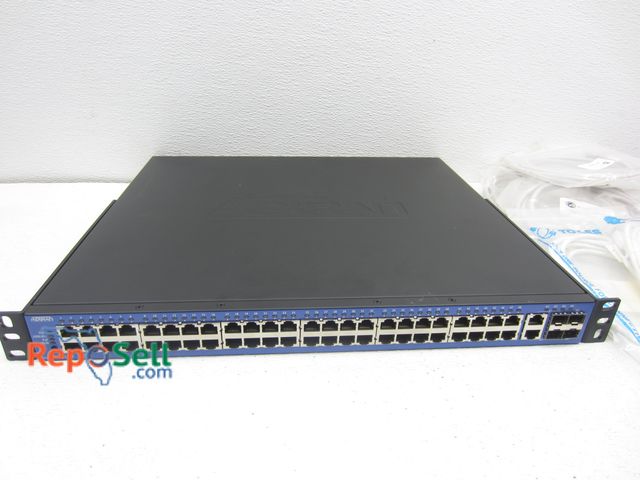 Lot 31-4482 - Adtran NetVanta 1238P 3rd Generation &amp; Various Assortment of Cables