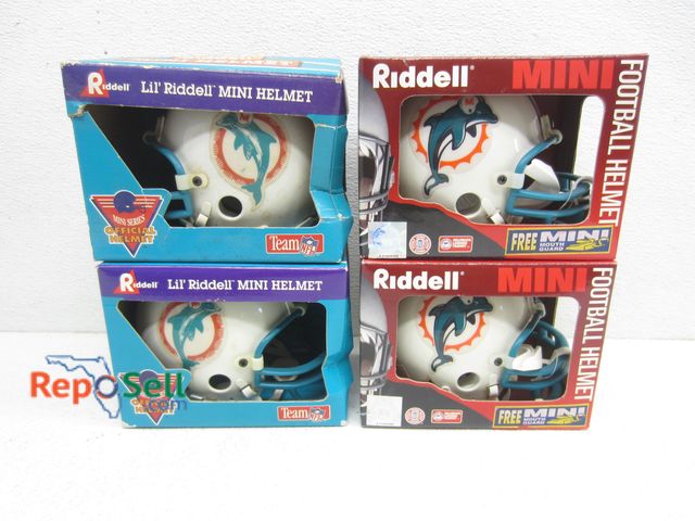 Lot 31-8141 - (4) Riddell Mini Miami  Dolphins Helmets