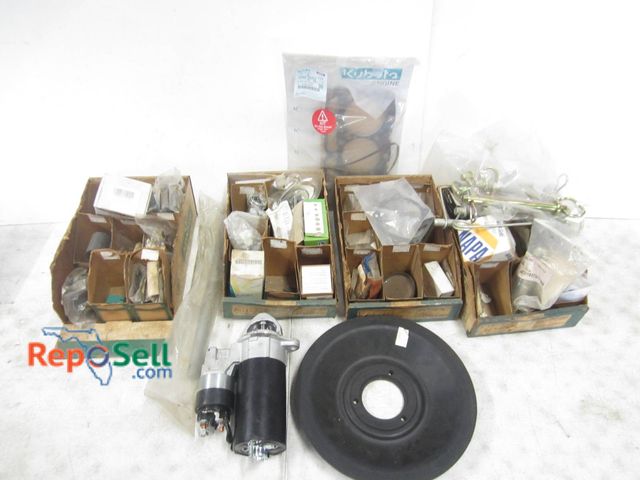 Lot 31-1262 - Includes Various Engine And Tractor Parts, Such As A Kubota Engine Kit, Starter Motor, Rubber Wheel,...