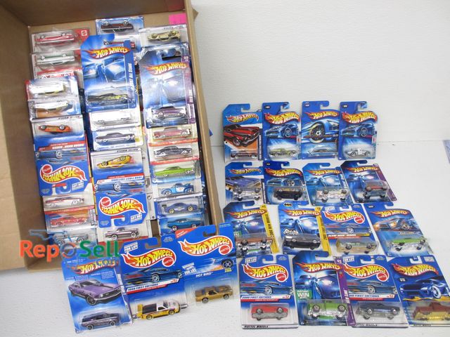 Lot 31-1060 - Approx. (65) Assorted Hot Wheels Diecast Cars; ALL NEW MOC; Includes American Muscle Cars, Redlines,...