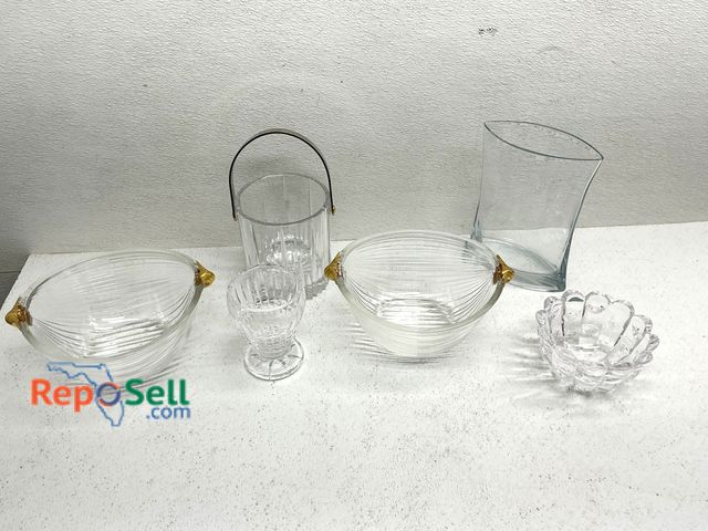 Lot 31-1401 - Six glass serving dishes of varying shapes and designs. Items include a crystal bowl with starburst ...