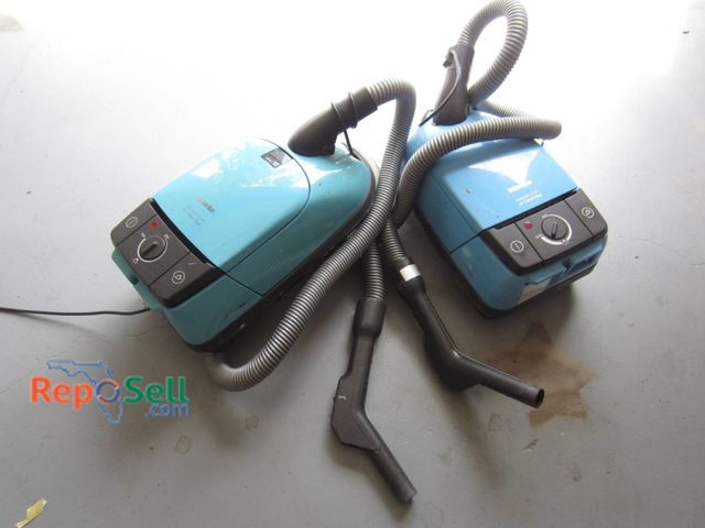 Lot 31-9220 - (2) Miele Electronic S318 Air Clean Plus vacuum cleaners in blue finish. Both Powers on