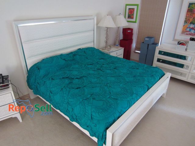 Lot 31-1233 - King Bed (Frame Matches Lot 1229), Headboard is White Upholstered, Mattress - Casper Memory Foam, In...