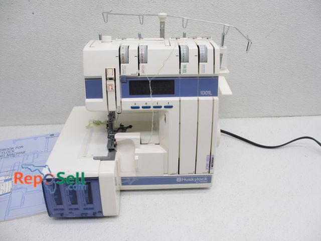 Lot 31-8081 - Husquarna Husky Lock Sewing Machine - Powers On