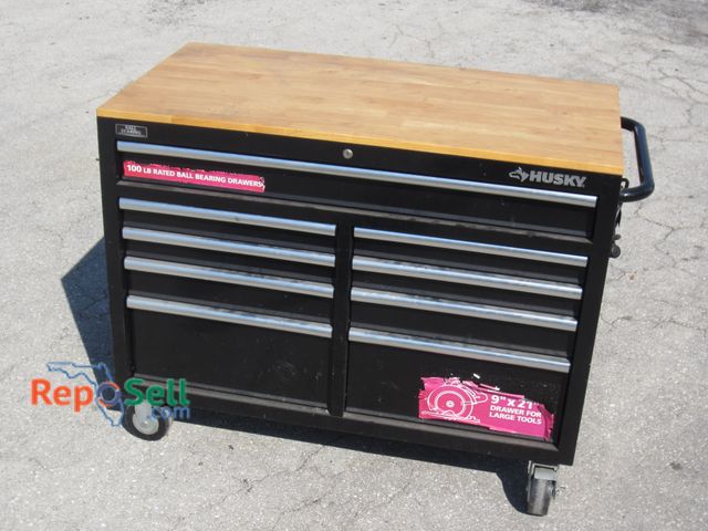 Lot 31-6253 - Husky 46" x 24" Rolling Toolbox with some tools.