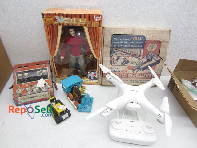 Lot 31-5523 - Misc Toys (Some Vintage): Nysync Marionette, Potensic Drone, Tonka Bulldozer, etc.