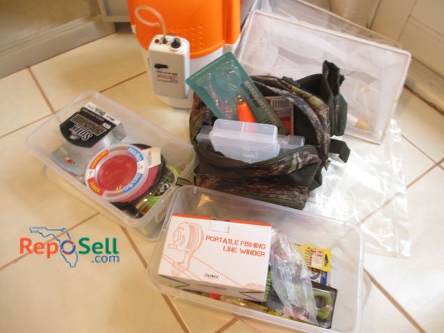 Lot 31-8676 - Fishing Lot: Engel Bait Bucket, Lures, Camo Bag, Line Winder, etc.