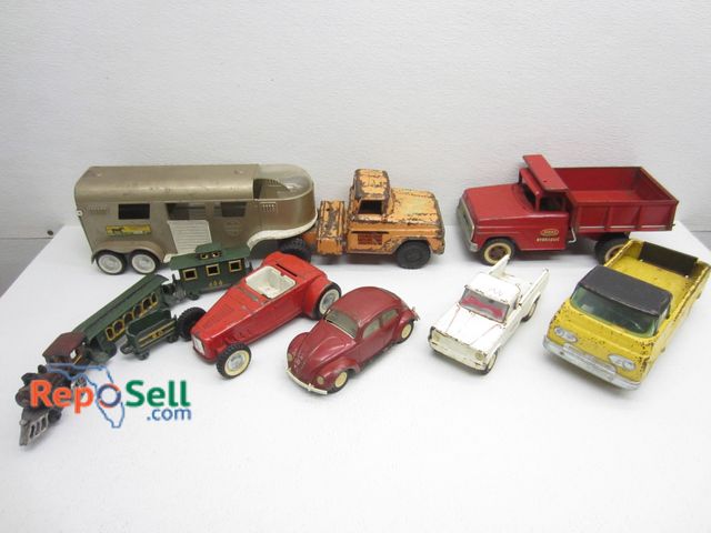 Lot 31-6380 - (7) Vintage Vehicles Nylint &amp; Tonka and (4) Metal Trains
