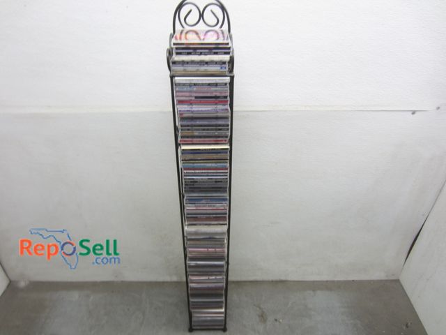 Lot 31-8528 - Approx (104) CD's With Stand: Alice In Chains, Dolly Parton, Mariah Carey etc