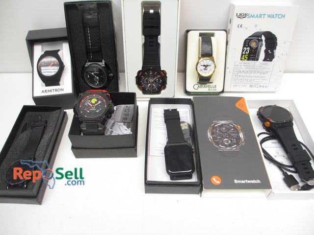 Lot 31-1037 - (9) New Watches with Boxes (need batteries): (4) Smart Watch, Armitron, Caravella, etc.