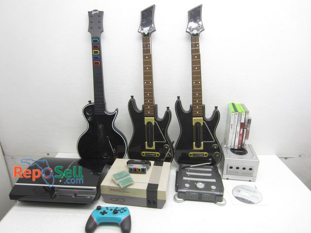 Lot 31-3188 - Lot of Video Games, Consoles, Accessories: PS3 &amp; Nintendo (both power on)