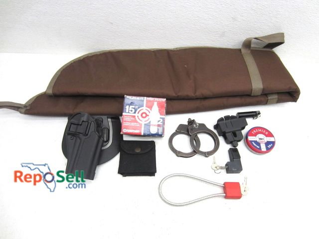 Lot 31-9551 - Firearm Acces: S&amp;W Handcuffs, Rifle Case, Holsters etc
