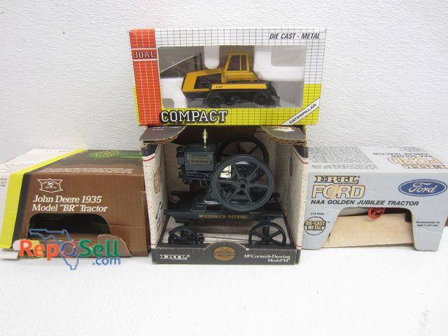 Lot 31-9380 - (3) New ERTL Tractors And CAT Challenger 65, All With Original Boxes: Ford NAA Golden Jubilee, McCor...