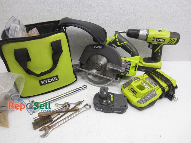 Lot 31-3438 - Ryobi Cordless Saw, Drill, Battery, Tool Bag And Charger With Assorted Tools - Power On