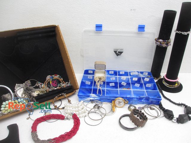Lot 31-1419 - Lot of Costume Jewelry with Storage Box and Stands