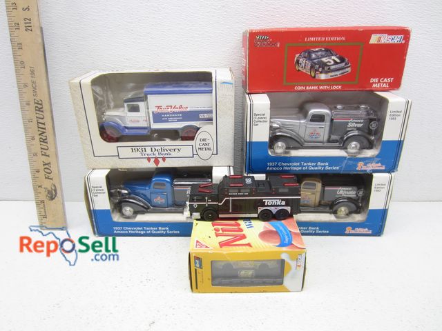 Lot 31-4189 - (7) Die Cast Trucks, (6) Metal With Original Box: (4) Amco, Nascar, Nilla Wafers etc