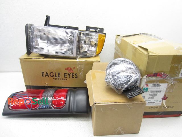 Lot 31-1108 - "94-"02 Dodge Ram Headlights, Tail Lights And Fog Lights - Appears New
